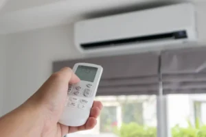 Depositphotos 568010048 stock photo hand remote control directed air